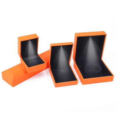 Đơn vị hóa kích thước thủ công màu cam LED Ring Box trang sức cho Logo tùy chỉnh và ánh sáng trắng