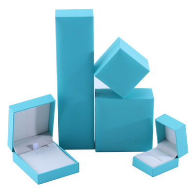 Sản xuất bán buôn Hòn đồ trang sức Ống đồ trang sức tùy chỉnh cao cấp vòng cổ vòng đeo tai Nhẫn trang sức thiết lập Bao bì giấy ván giấy màu xanh trời lật hộp trang sức với logo